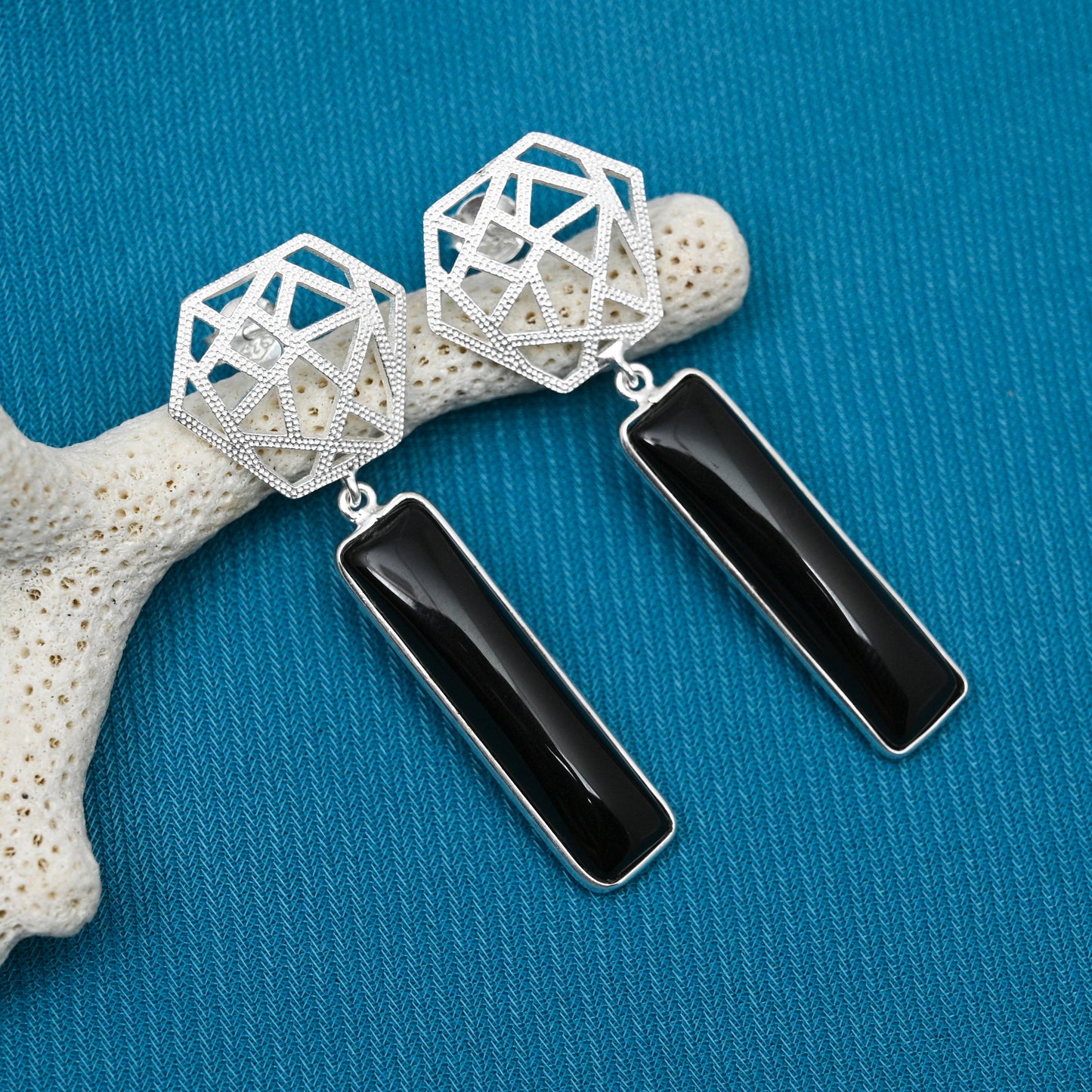 Black onyx studded silver earrings for your party wear look