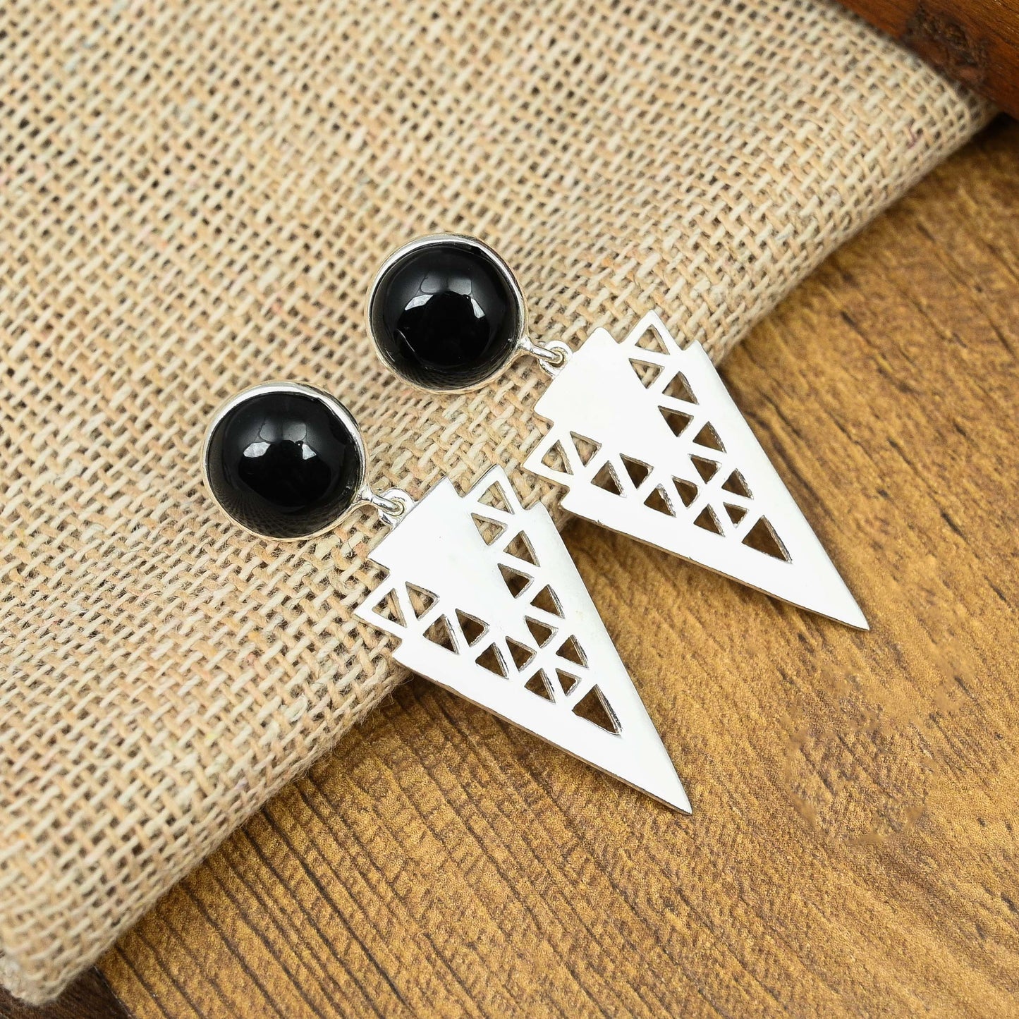 Sterling Silver earrings featuring stunning Black onyx gemstones in round shape.