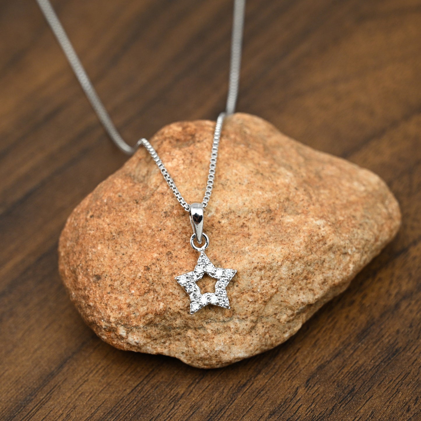 Star Shaped Hollow Silver pendant in Cubic Zirconia with chain